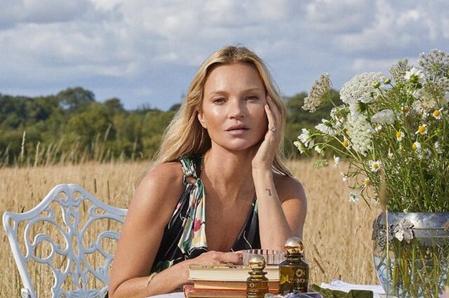 Kate Moss, the enigmatic supermodel, captivating with her timeless presence.