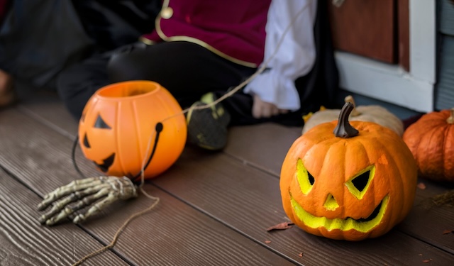 The festive decorations that sparked the neighborhood tension — pumpkins, lights, and spooky props