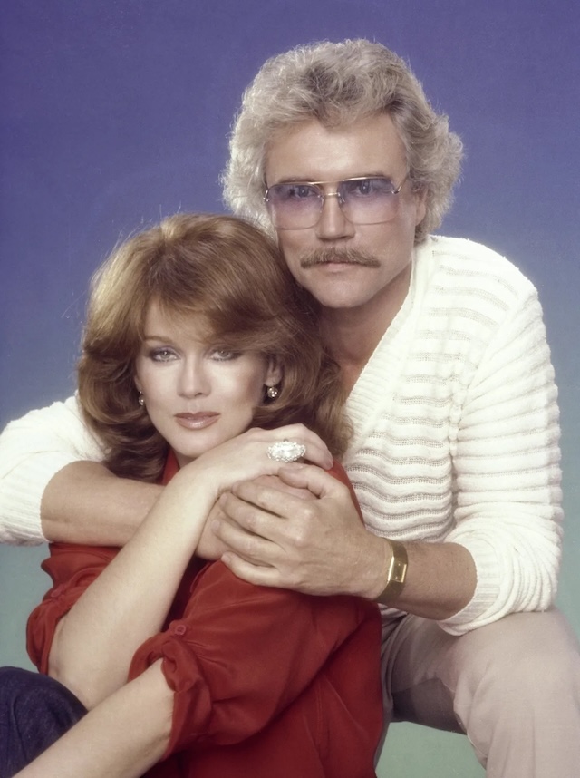 The singer and actress and husband Roger smith pose for a portrait in the 1980s