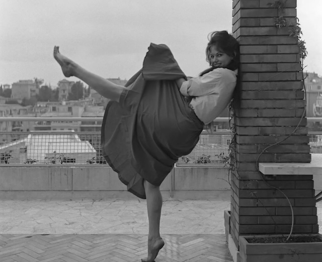 Claudia Cardinale pictured dancing on a terrace on January 1, 1959 in Rome, Italy