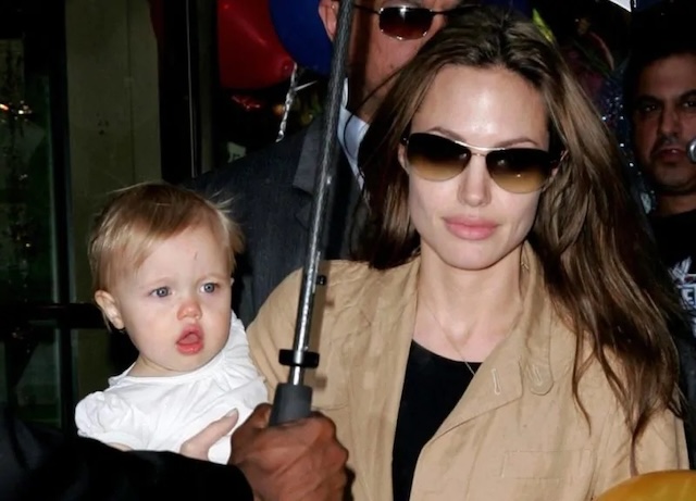 A throwback moment with Angelina Jolie and a young Shiloh Jolie-Pitt, showcasing the tender years of childhood and a mother's loving embrace