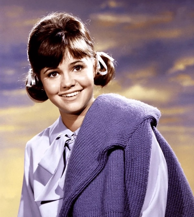 Young Sally Field in her breakout role as "Gidget," capturing the joy and charm that made her a beloved star