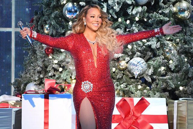 Mariah Carey's performance in front of a Christmas tree in her dazzling red dress continues to captivate fans worldwide, earning her the beloved title of the "Queen of Christmas.