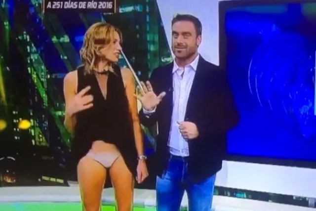 A Brazilian presenter experiences an embarrassing wardrobe malfunction on live TV.