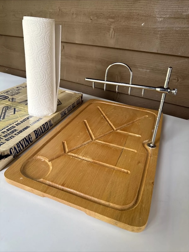 Even with its vintage charm, this meat carving board still finds a place in modern kitchens, a true testament to its lasting design