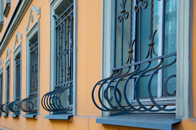 A closer look at window grills with bottom curves, blending style and practicality