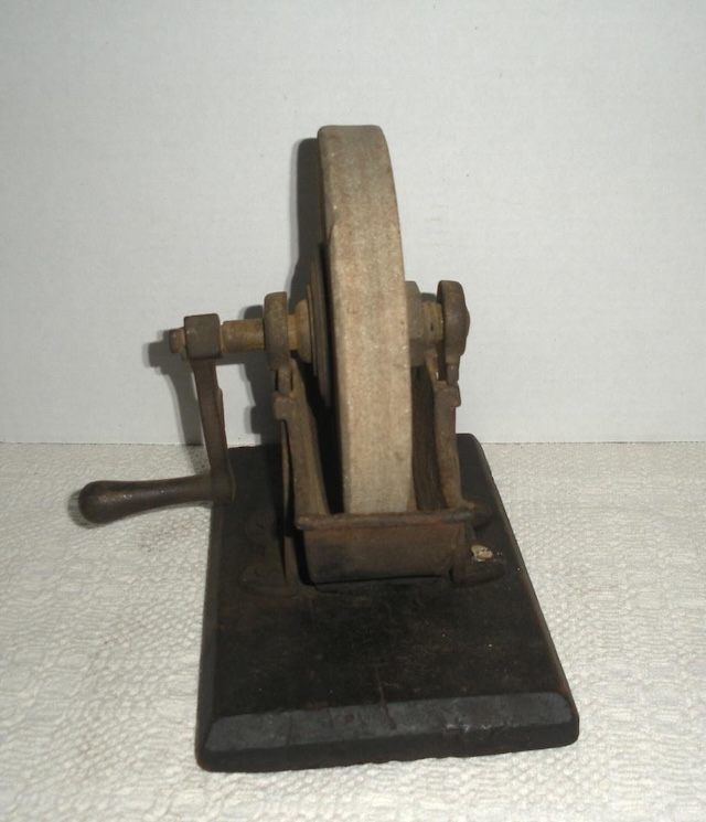 The Antique Cast Iron Hand Grinder Sharpener Stone Wheel was a workshop staple—now a piece of history