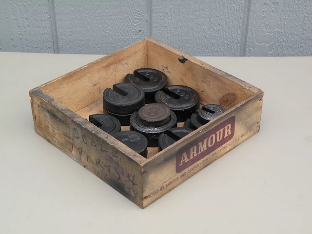 Heavy-duty scale weights like these were once crucial for measuring goods in the era before digital scales took over