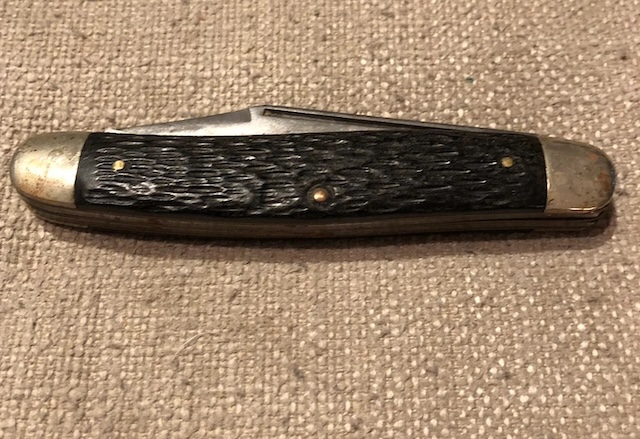 An elegantly designed pocket knife featuring a textured handle, highlighting its combination of form and function that has served many generations