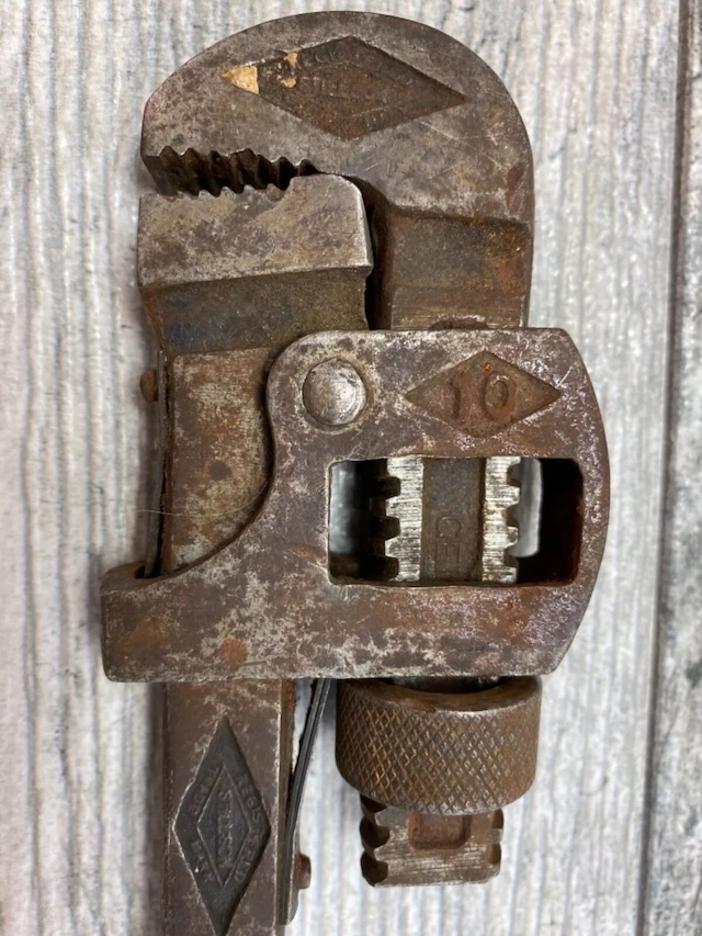 Detailed view of the wrench’s adjustment mechanism, revealing the craftsmanship behind this iconic tool that defined an era