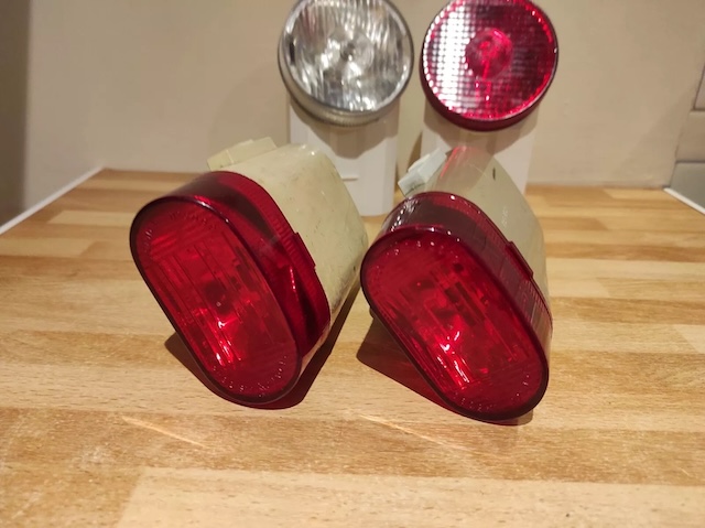 Rear view of the vintage lights, emphasizing the textured red lens designed to enhance safety and signal presence on the road