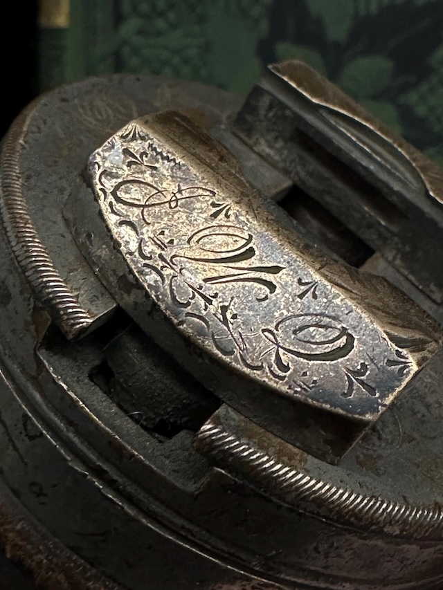 The fine engravings and intricate design on the rotating mechanism exemplify the skill that went into creating these timeless tools