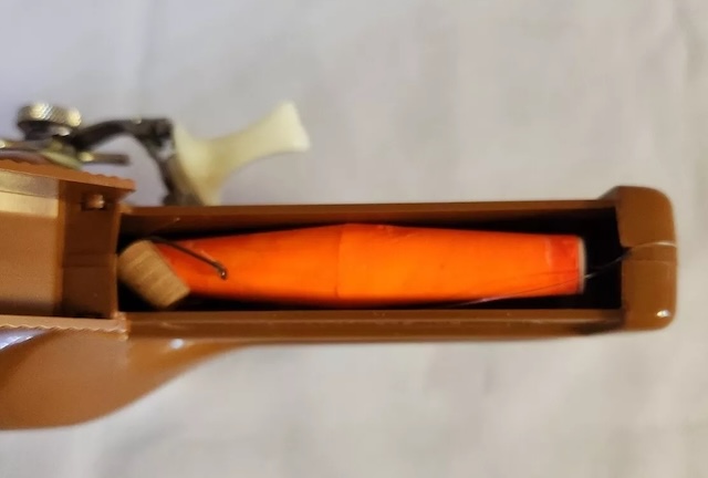 A glimpse inside the cleverly designed compartment of the Pocket Fisherman, perfect for storing lures and hooks