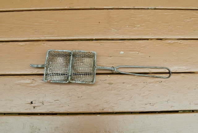 An open look at the soap saver’s wire basket design, allowing a glimpse of its ingenious simplicity for collecting and reusing soap scraps