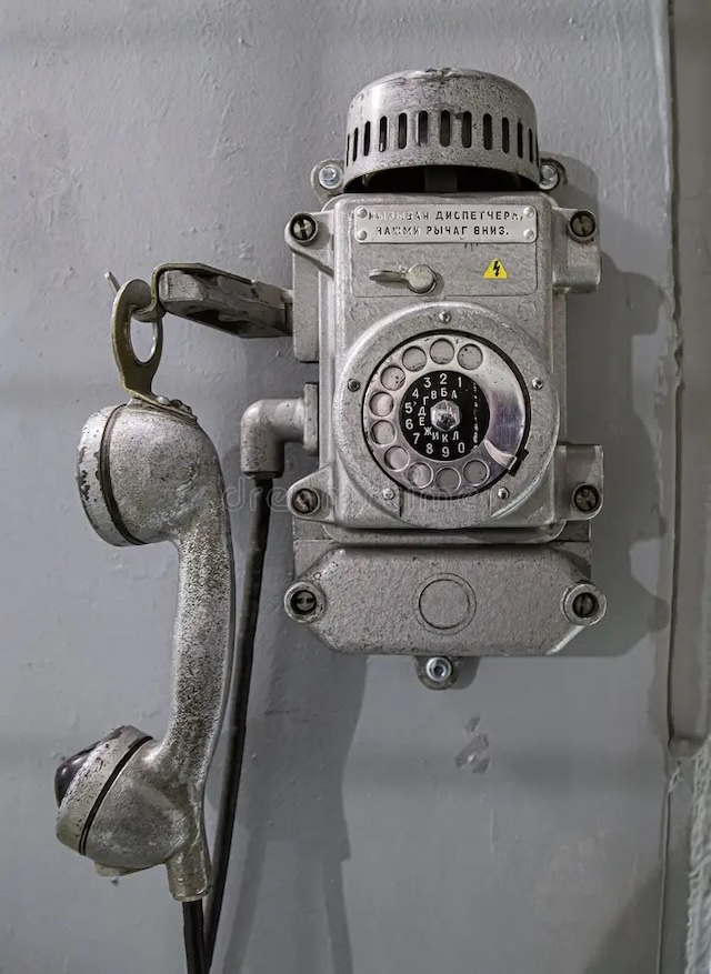 An iconic industrial phone, built for dependability and efficiency, still carrying the marks of its years of service in demanding conditions