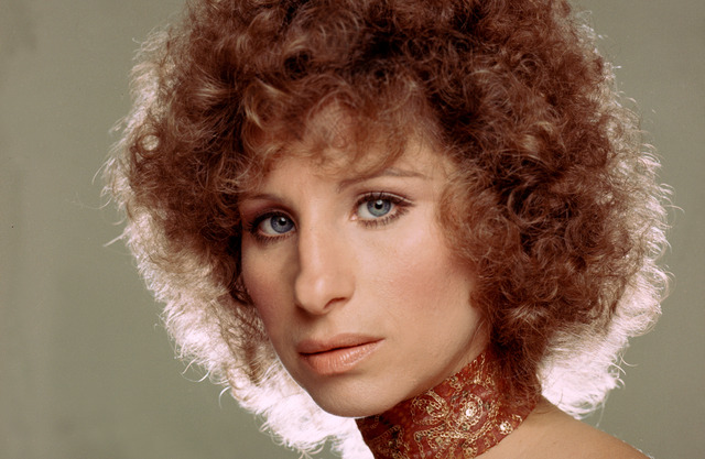 A young Barbra Streisand in her prime, capturing hearts with her unique beauty and talent.