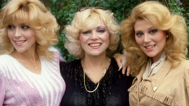 Audrey Landers and Judy Landers sharing a joyful moment alongside their mother, Ruth Landers, showcasing the family’s radiant smiles and charm.