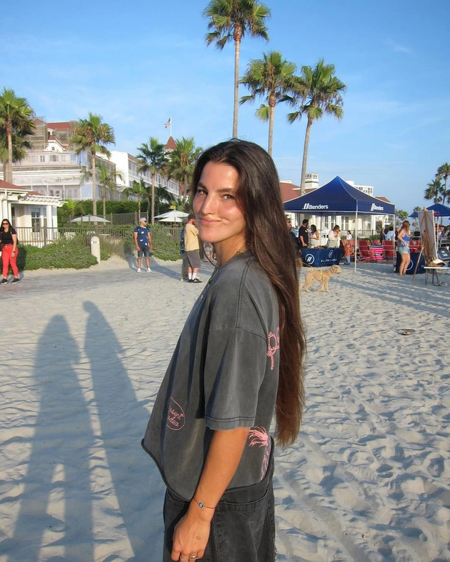 Brooklinn enjoying a serene day on the beach, exuding confidence and peace as she continues her journey.