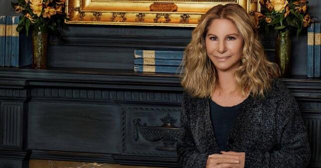 Posing confidently, Barbra Streisand merges her role as an entertainer with her dedication to social issues.