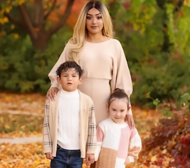 A heartwarming photo of Erika and her kids enjoying a fall day, showcasing their unbreakable bond and love