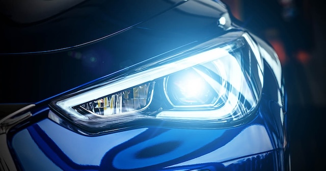 A clear image of a modern LED headlight, showcasing its design and brightness