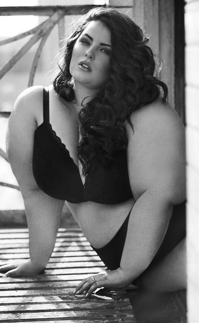 Tess Holliday confidently flaunts her curves in a side-profile shot, emphasizing the importance of self-love and acceptance