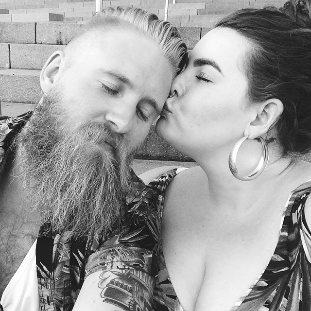 Tess Holliday and her partner share a tender moment, capturing the essence of true love and happiness beyond external appearances