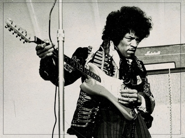 Jimi Hendrix, performing with unmatched energy and style, cementing his legacy as one of the greatest guitarists in music history