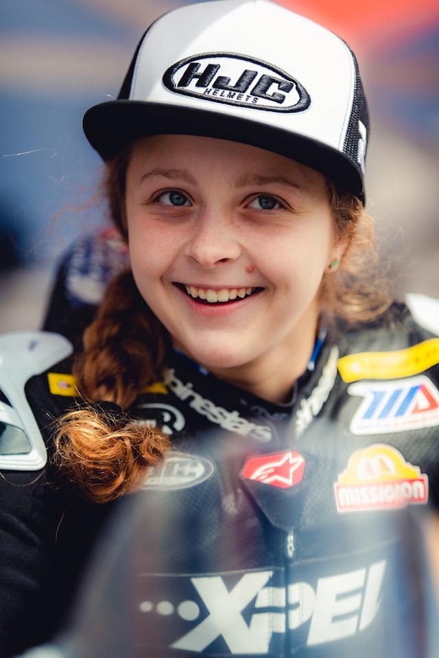 Kayla Yaakov looking confident and ready to take on the next challenge, showcasing her dedication and passion for motorcycle racing