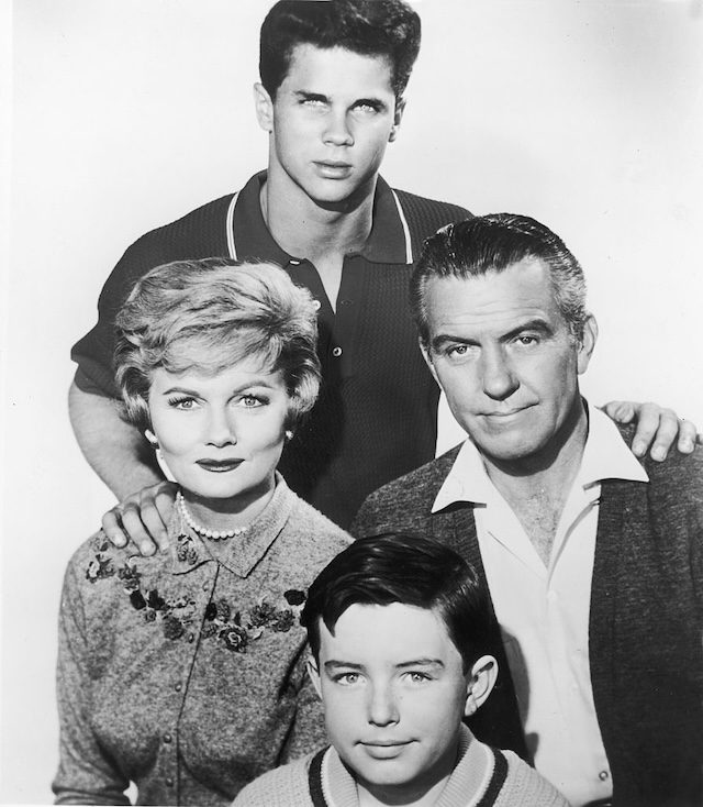 The Cleaver family in their iconic TV portrait, capturing the wholesome charm of Leave It to Beaver. From left to right: Wally, June, Ward, and Beaver