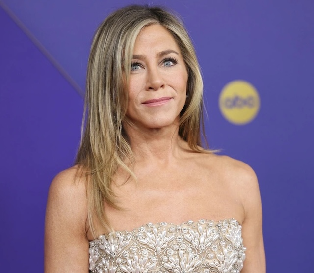 Jennifer Aniston attending the 76th Emmy Awards, looking flawless in her signature look with longer hair