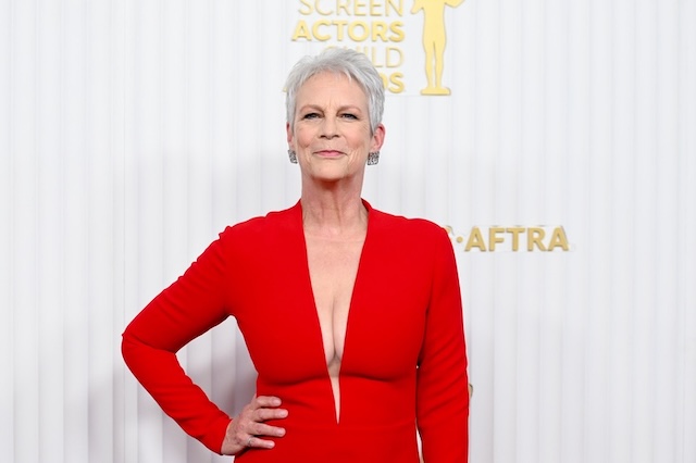 At the Screen Actors Guild Awards, Jamie Lee Curtis stuns in a bold red gown, radiating elegance and poise