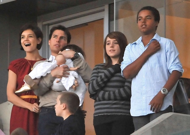 A family outing where Tom Cruise, Katie Holmes, and his children share a joyful moment together