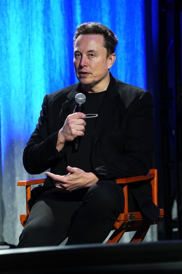 Elon Musk addresses an audience, discussing his views on future projects, just after the controversy surrounding his social media remarks about Taylor Swift