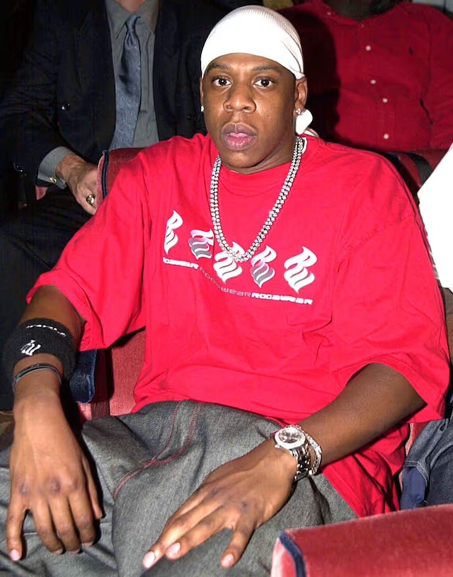 Jay-Z captured during an event, offering a candid look at his charismatic and laid-back demeanor