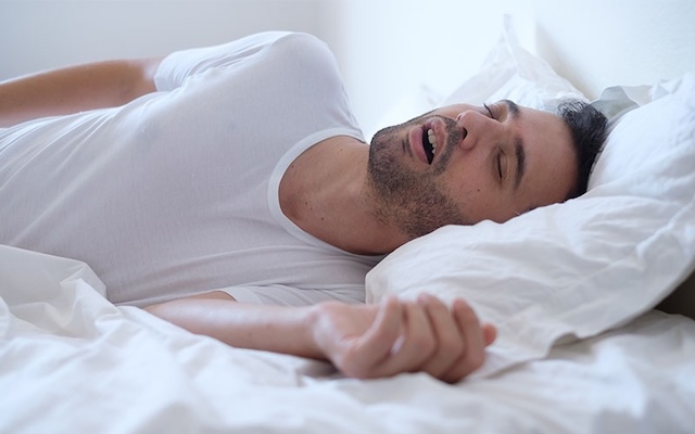 Snoring often occurs due to relaxed throat muscles and obstructed airways during sleep. Side sleeping can help