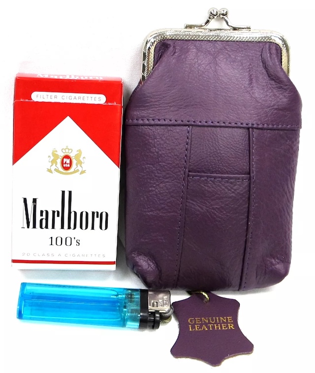 The classic setup – a pack of Marlboro 100’s, a lighter, and a purple vintage cigarette purse ready for the day