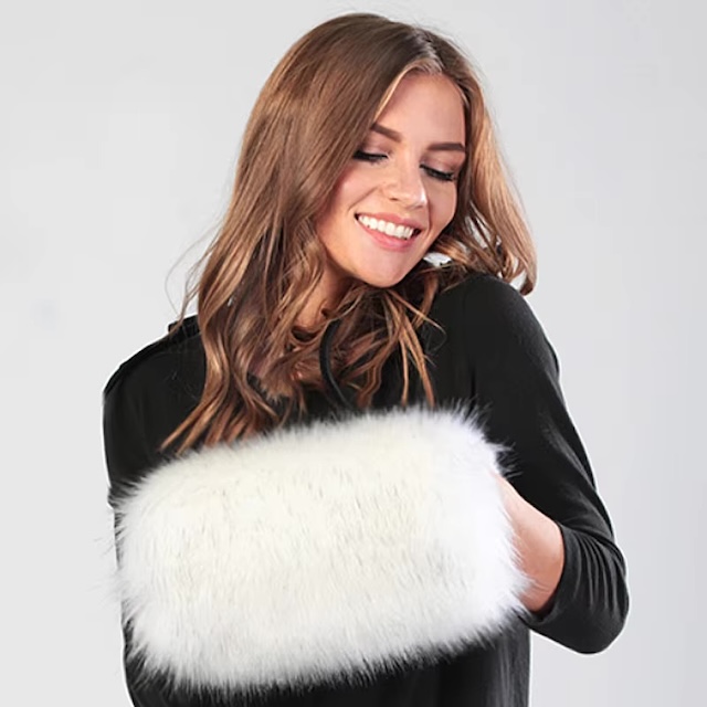 This vintage fur hand muff was more than just practical; it was a luxurious accessory for a refined winter look