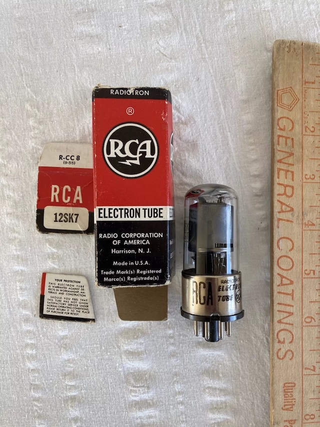 An RCA 12SK7 Electron Tube with its vintage box and historical branding, highlighting its significance in early radio communications