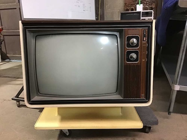 This retro vintage Zenith TV with dials and knobs was how families enjoyed evening entertainment before remotes and digital channels