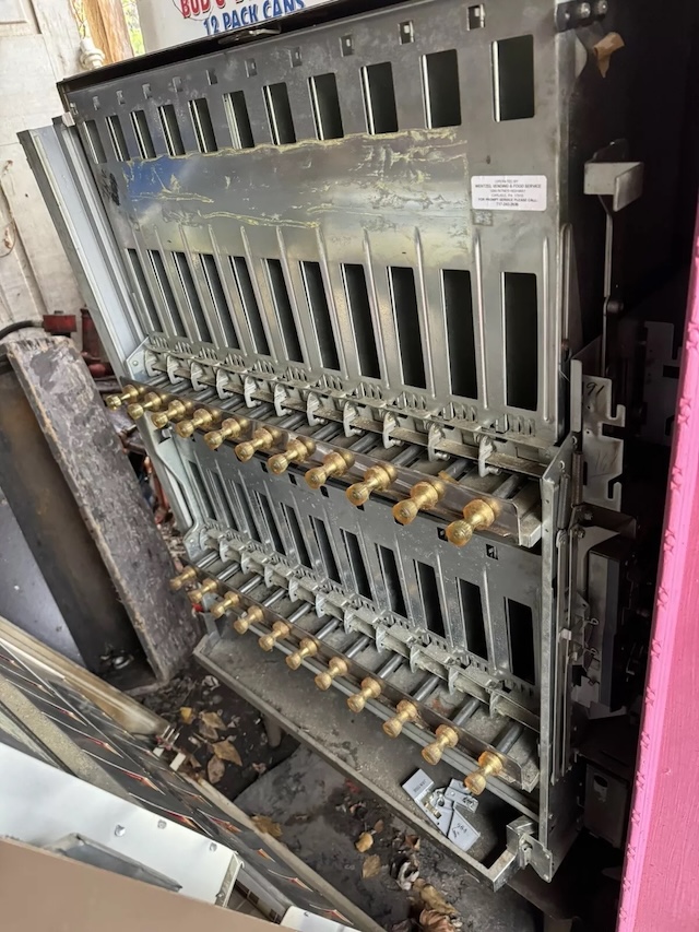 An internal view of the cigarette vending machine's mechanical system—sturdy, functional, and built to last through years of operation