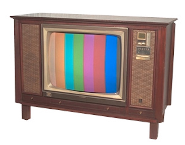 The charm of the vintage Zenith TV with its wood-paneled exterior and colorful screen evokes nostalgia for simpler times and shared family moments