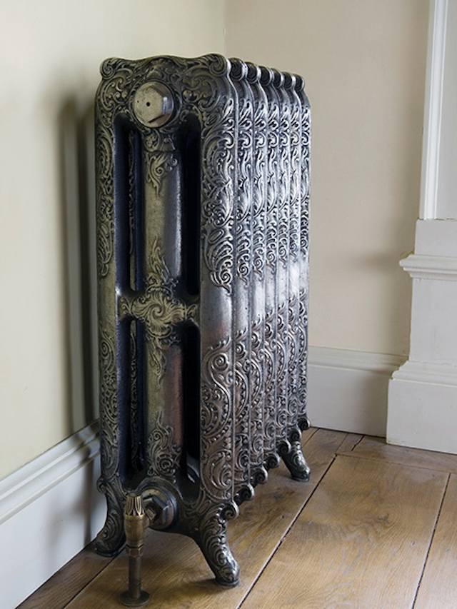 Once a staple of Victorian design, this intricately detailed vintage cast-iron radiator symbolized both practicality and artistry