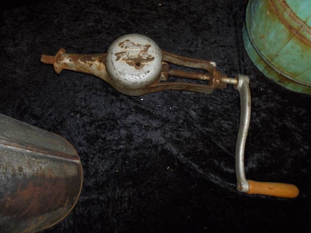 The iconic hand crank mechanism of the Vintage Mary Proctor Ice Cream Maker, showcasing its durable and practical design that brought families together for dessert-making