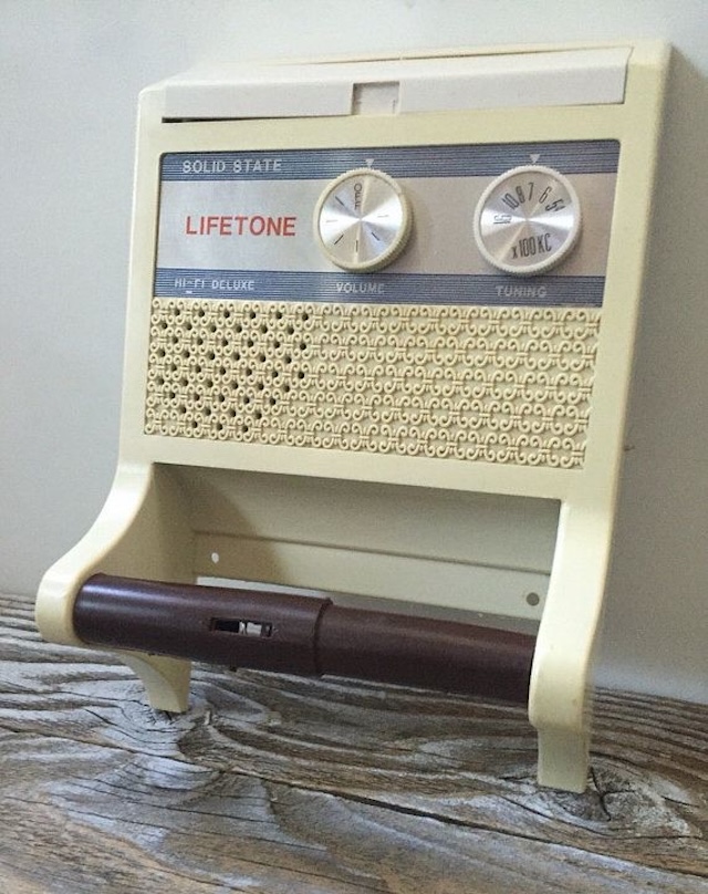 The Lifetone solid-state vintage bathroom radio, a classic design in cream and brown, combining practical toilet paper storage with retro audio charm