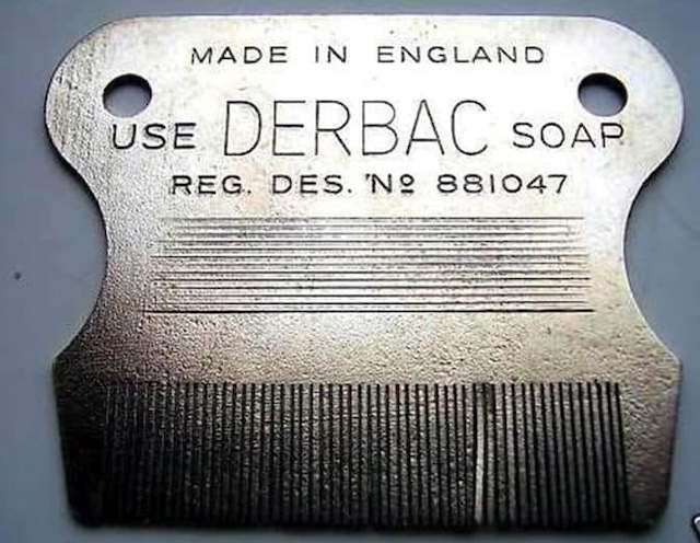 The shiny nit comb bears the prominent branding of Derbac Soap, a nostalgic nod to the days of careful grooming rituals