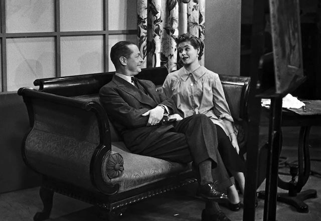 Robert Montgomery with his daughter, actress Elizabeth Montgomery, on a film set, around 1955