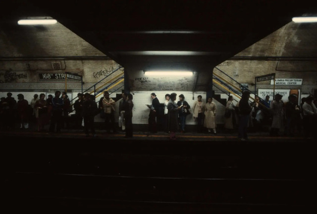 Commuters patiently wait for their train at the 168th Street station in Manhattan, a bustling hub of activity in 1981.