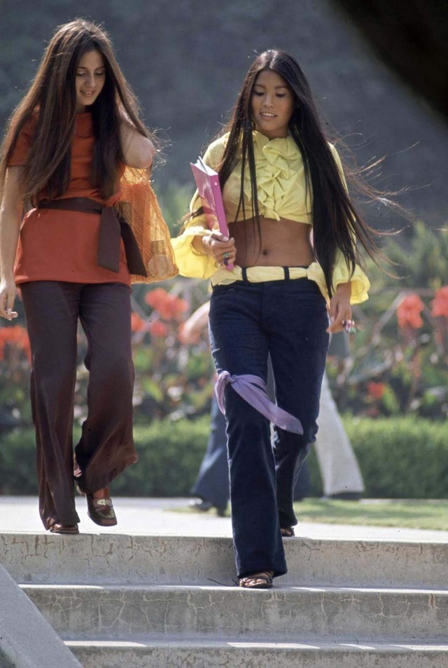 Two students from Southern California high schools were caught in the moment, flaunting their rebellious yet stylish outfits that defined the era.