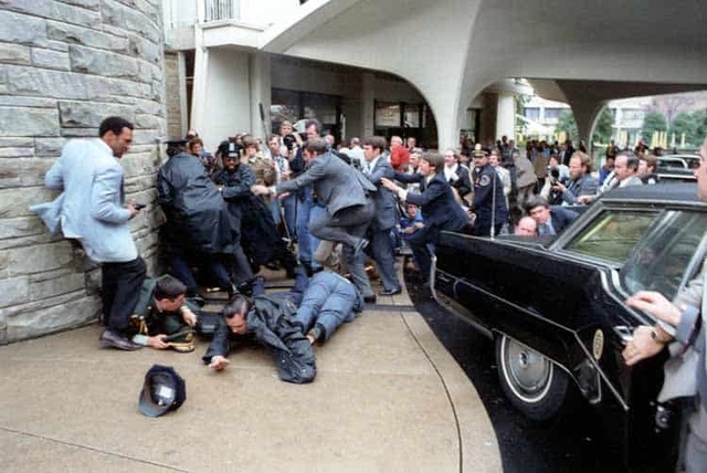 John Hinckley Jr. attempted to assassinate President Ronald Reagan as he exited the Washington Hilton Hotel.